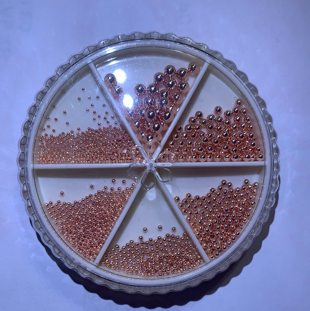 Rosegold metal caviar